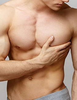 Expert surgeons treat drug-induced gynecomastia with male breast reduction at Sushruta Centre, Peelamedu.