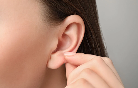 Skilled specialist in earlobe hole repair surgery located Near Avinashi Road with great results.